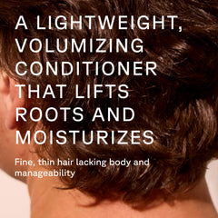 Acure creamy conditioner texture close-up for quick absorbing moisture