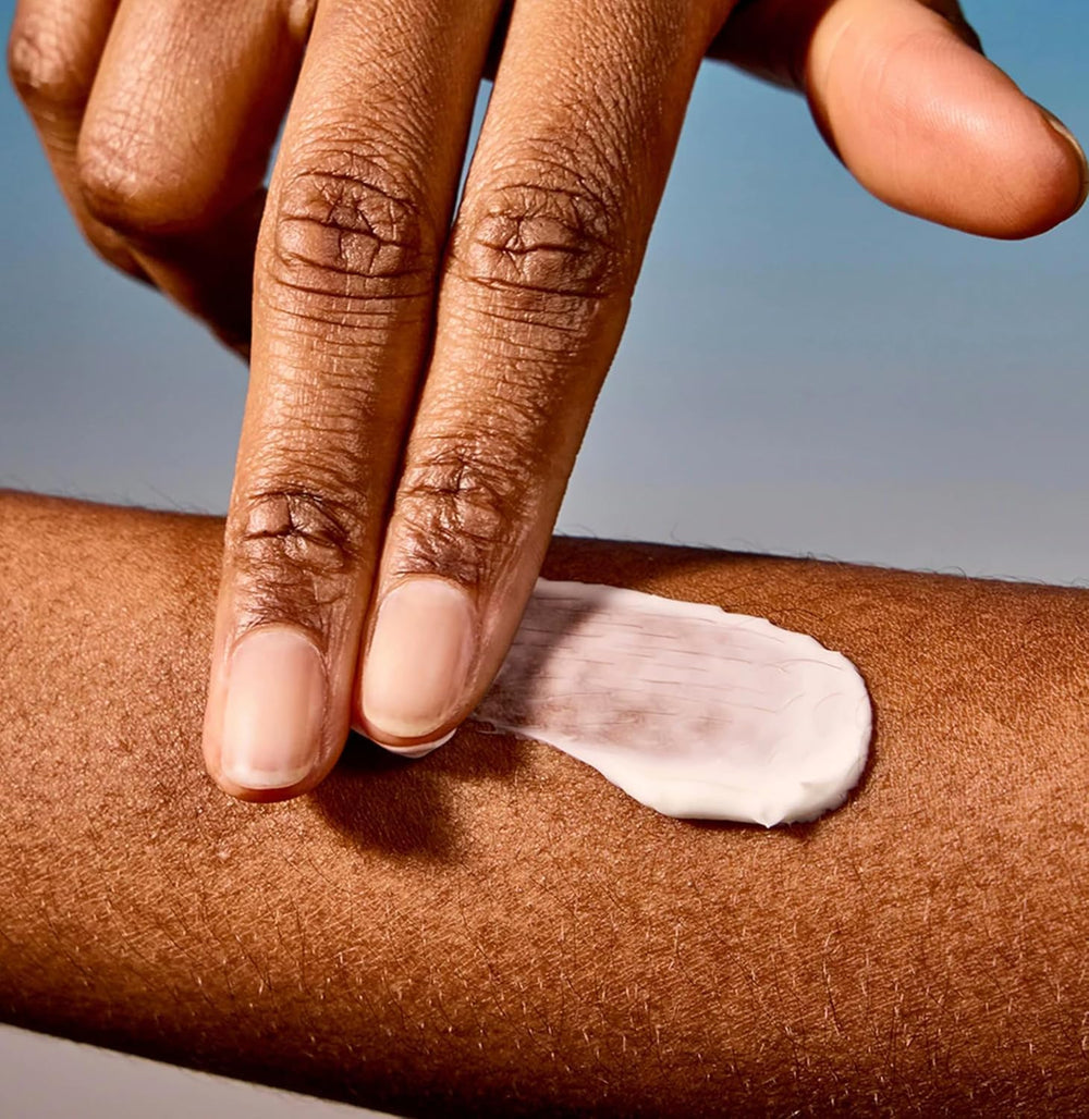 Acure night cream spread on skin demonstrating nourishing overnight hydration