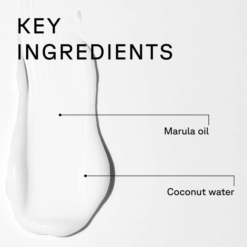 Acure conditioner applied to wet hair in shower for detangling and hydration benefit