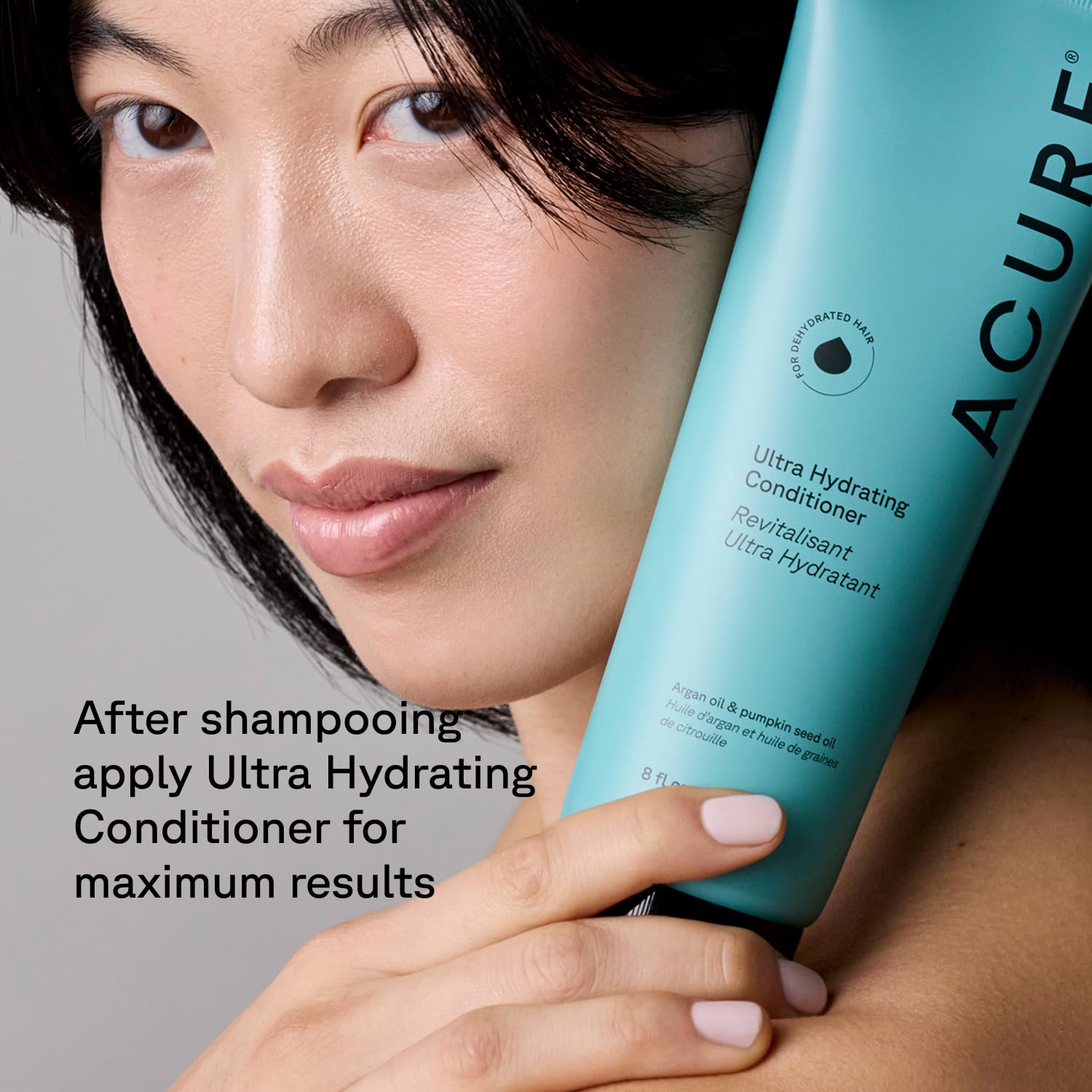 Acure 8 fl oz bottle held in hand showing actual size and travel-friendly volume