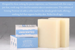 Adams Handmade Soap bar in hand producing soft lather to demonstrate gentle cleansing
