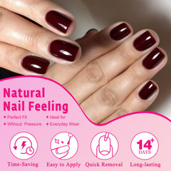AddFavor woman typing with short burgundy nails showing functional everyday comfort