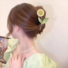 ADULLPONY sunflower clip worn in hair for elegant hold and visual flair