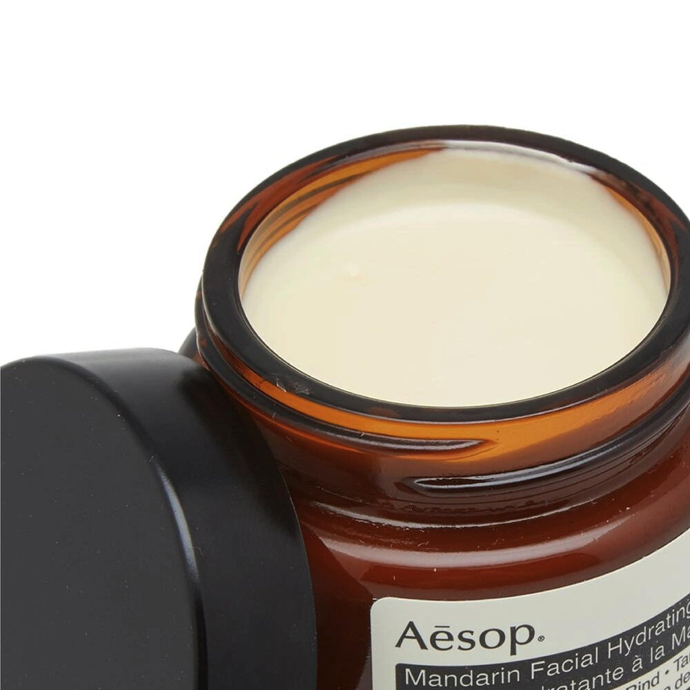 Aesop mandarin lemon and tangerine rinds arranged to show natural botanical ingredients