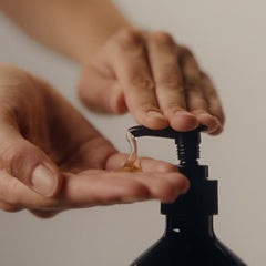 Aesop hand balm spread on skin illustrating smooth absorption and conditioning benefit