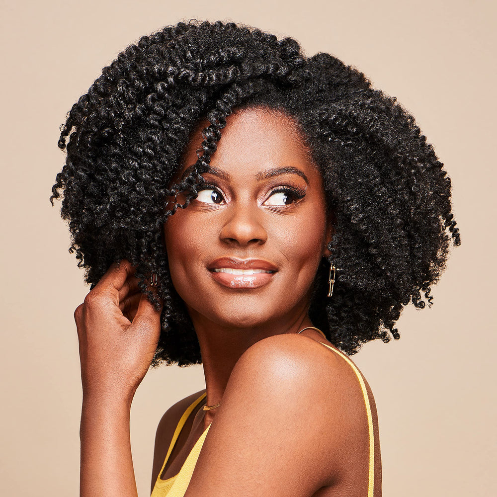 African Pride coconut oil ingredient showing smoothing benefit