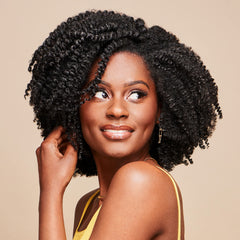 African Pride coconut oil ingredient showing smoothing benefit