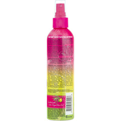 African Pride applied to child's curls showing smoother, more manageable hair benefit