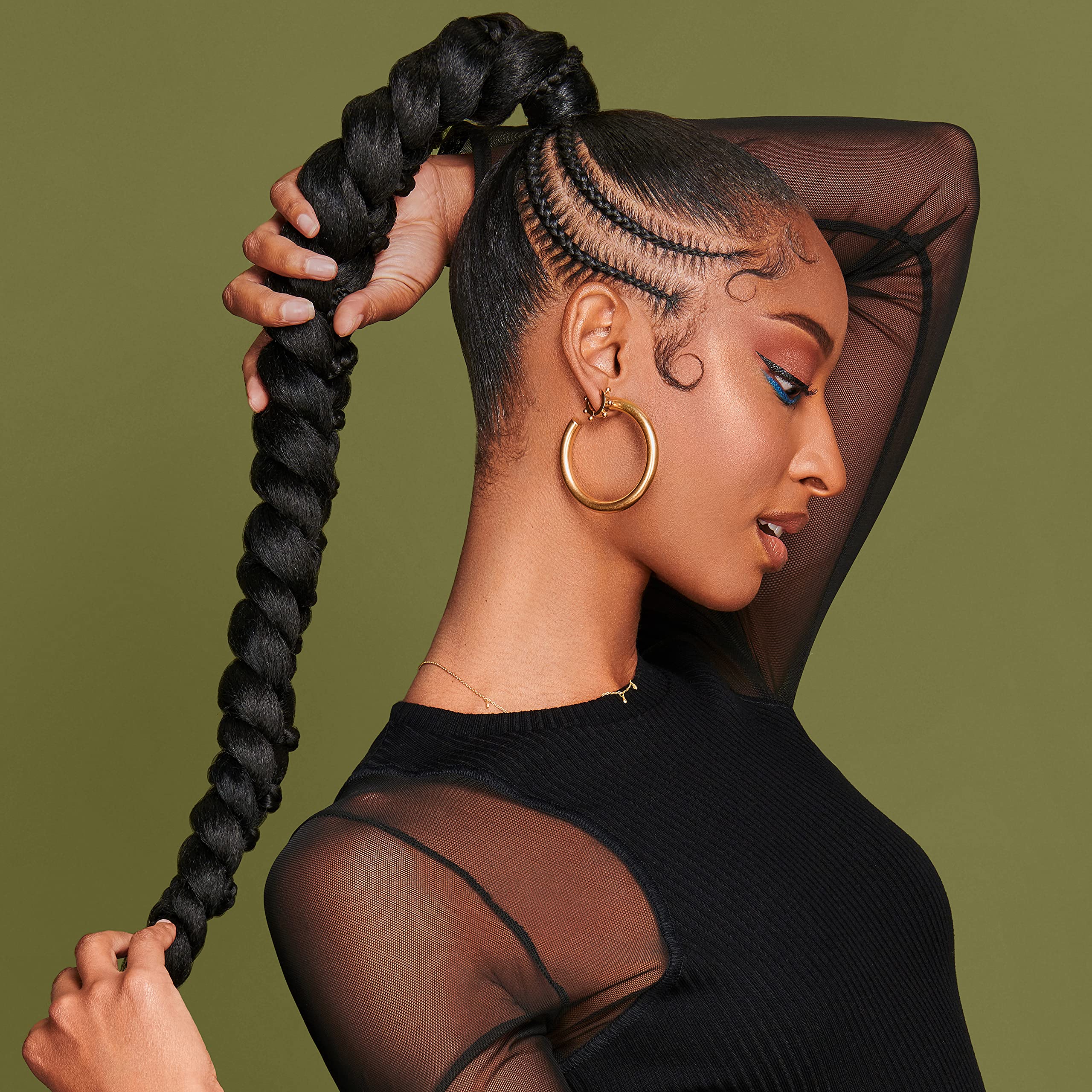 African Pride droplet on hand showing lightweight texture and slip