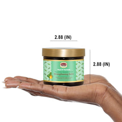 African Pride applying balm to scalp demonstrating edge protection benefit