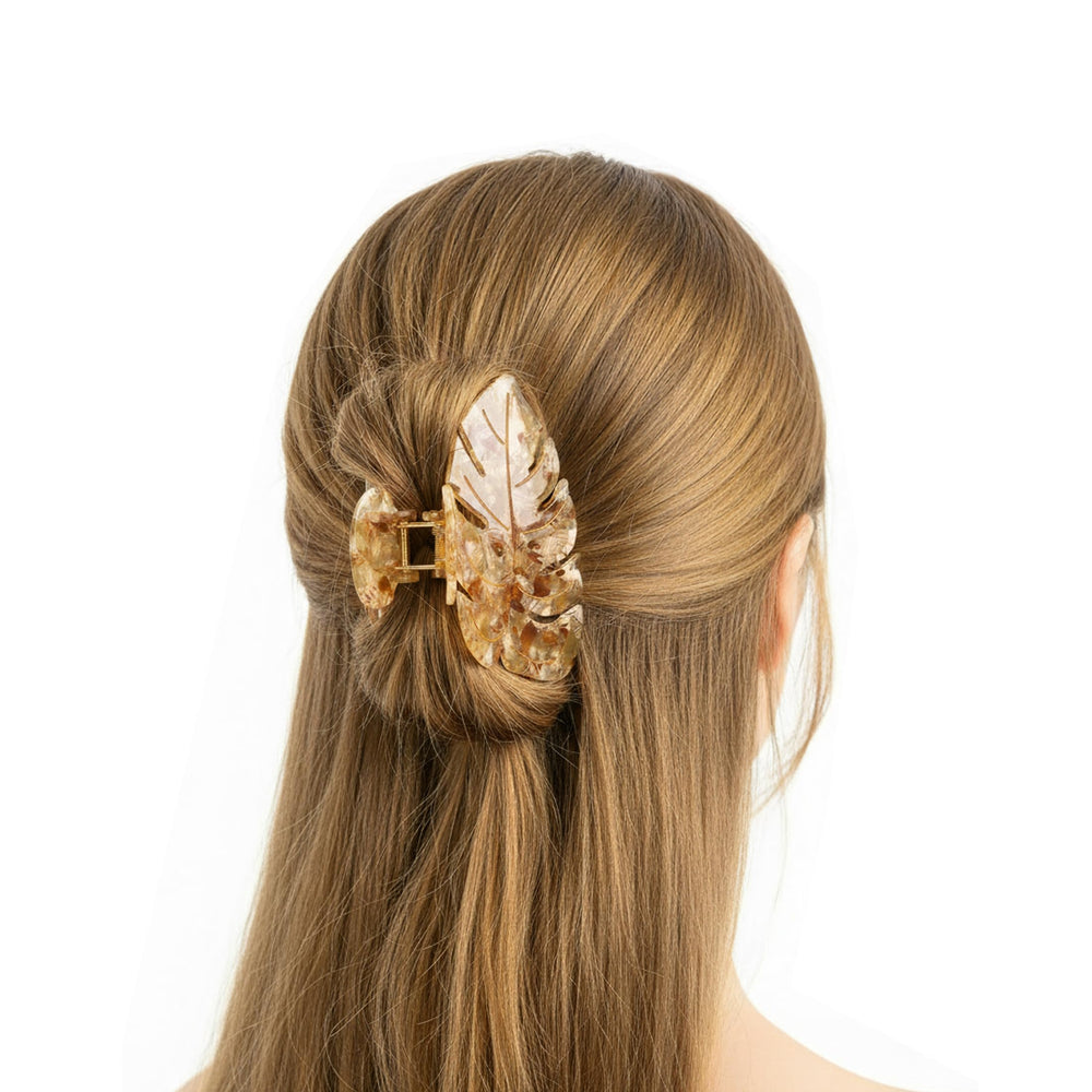 Agirlvct clip holding a half-up hairstyle for neat everyday styling