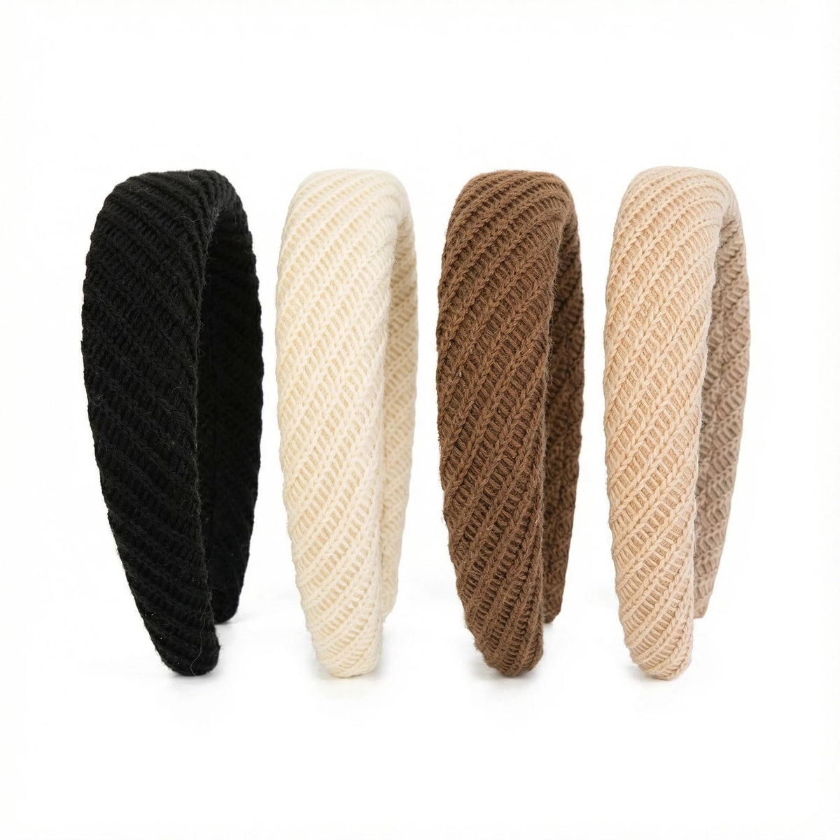 Agirlvct front view of the four neutral headbands showing neat packaging and versatility