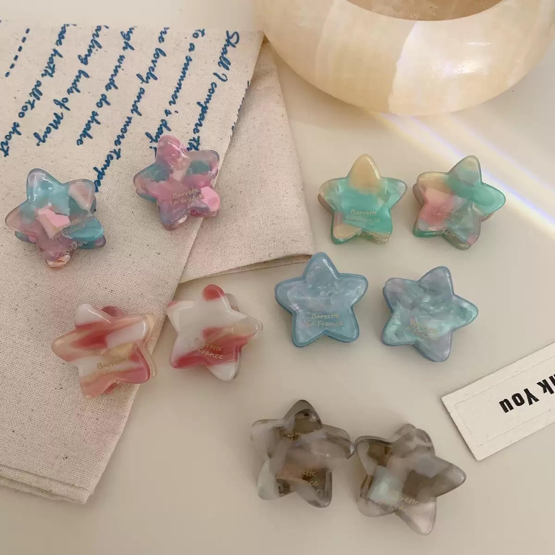 Agirlvct clips decorating a bun for stylish, secure finish benefit