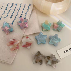 Agirlvct clips decorating a bun for stylish, secure finish benefit