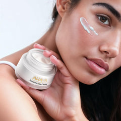 AHAVA model applying cream to face, depicts visible softening and priming