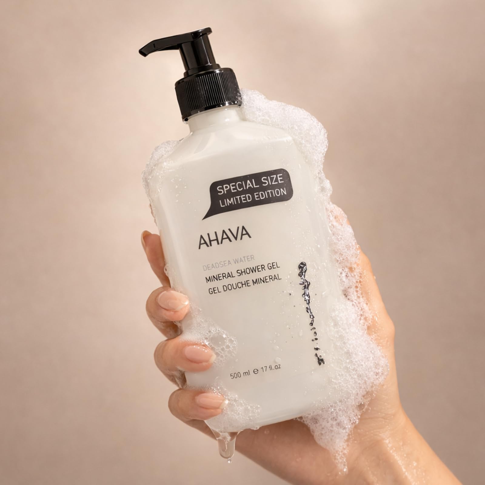AHAVA shower gel in use under shower highlighting cleansing and soothing effect