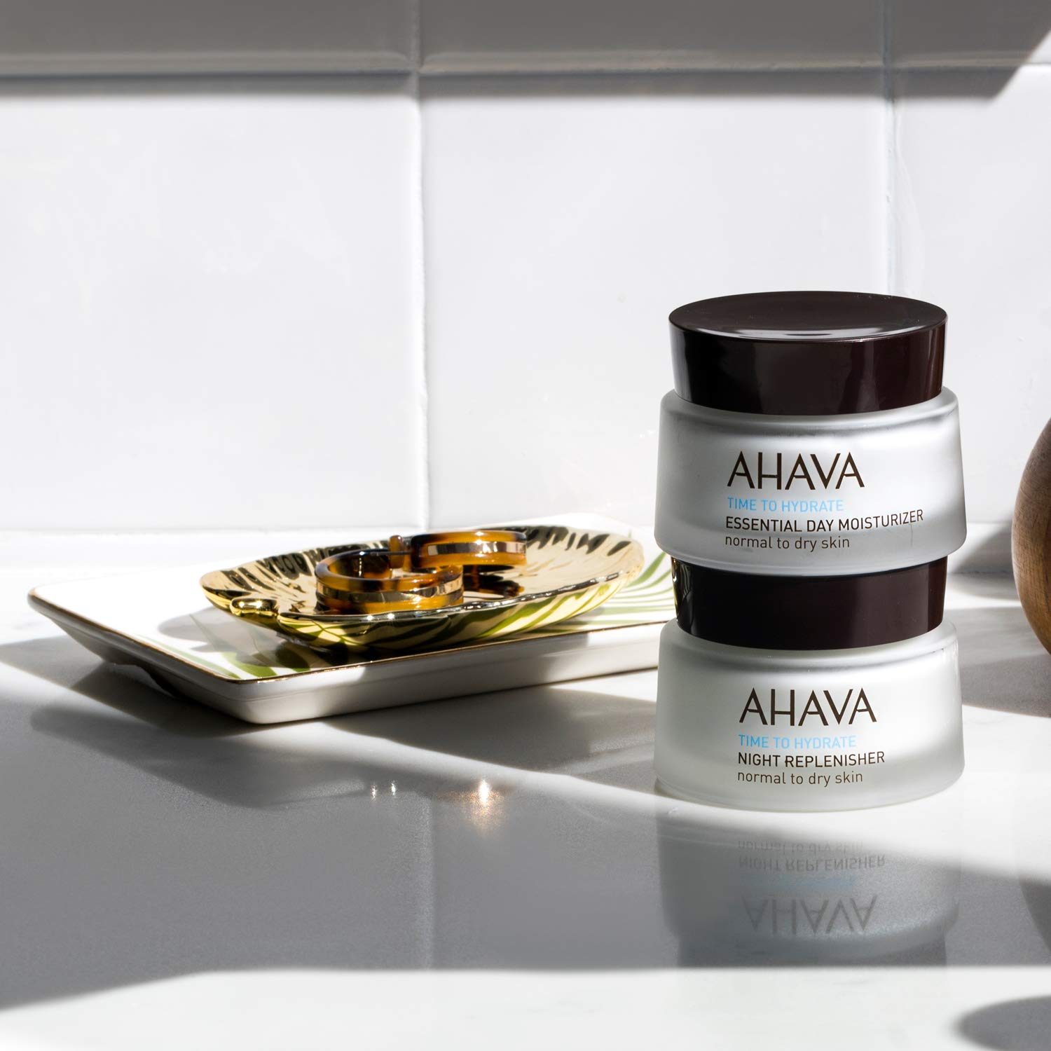 AHAVA product label close-up showing ingredient highlights and usage guidance benefit