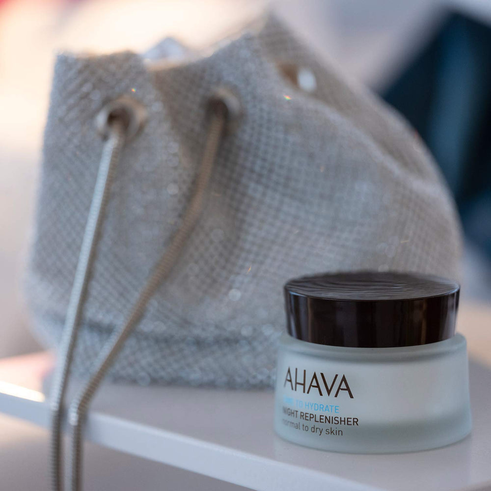 AHAVA open jar displaying velvety cream texture for rich overnight hydration benefits