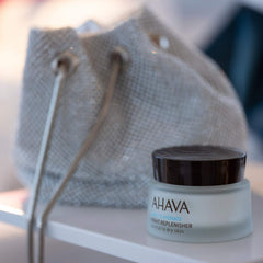 AHAVA open jar displaying velvety cream texture for rich overnight hydration benefits