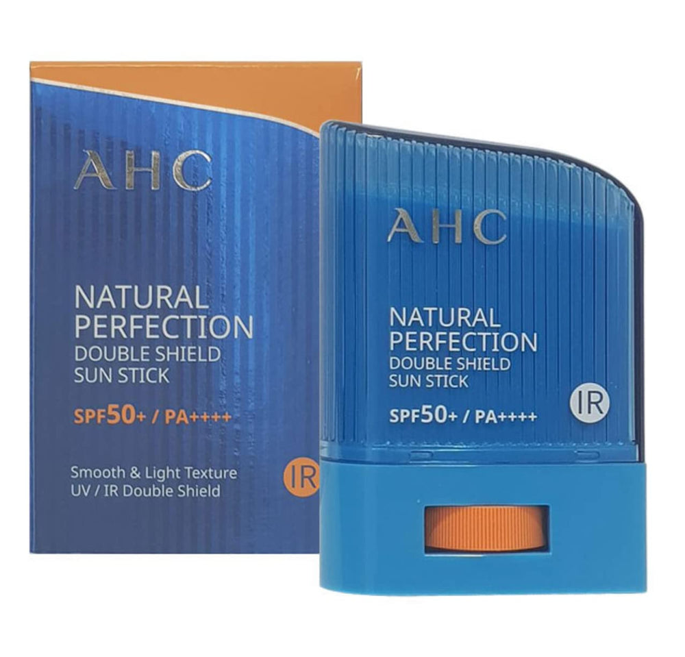 AHC sun stick applied to cheek demonstrating precise, non-greasy coverage for touch-ups