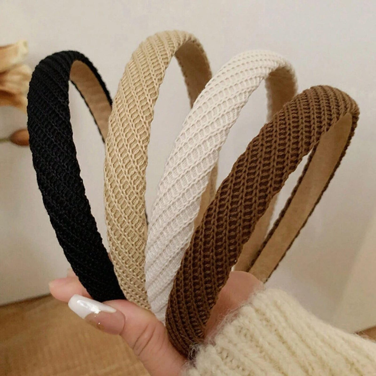 AIBFRID front view of four headbands showing colors and compact packaging for easy gifting