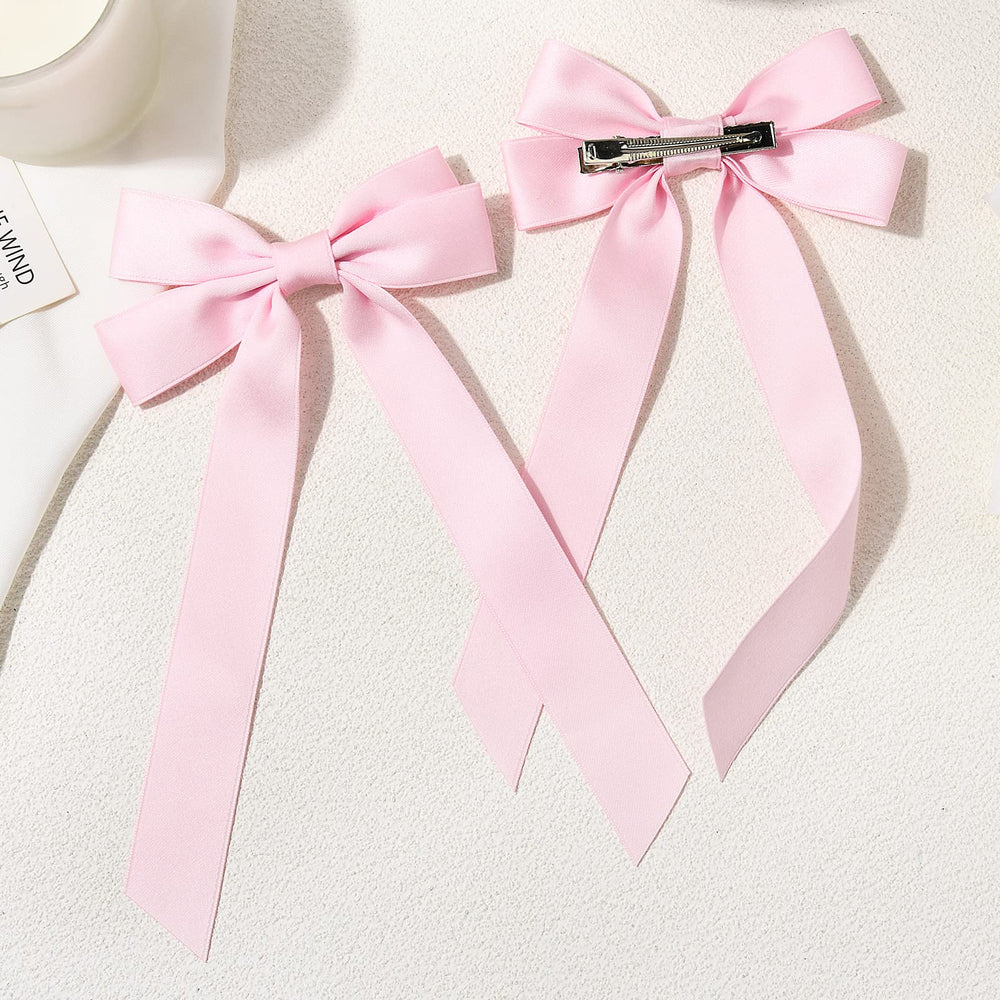 Aileam bows attached to headband offering styling versatility