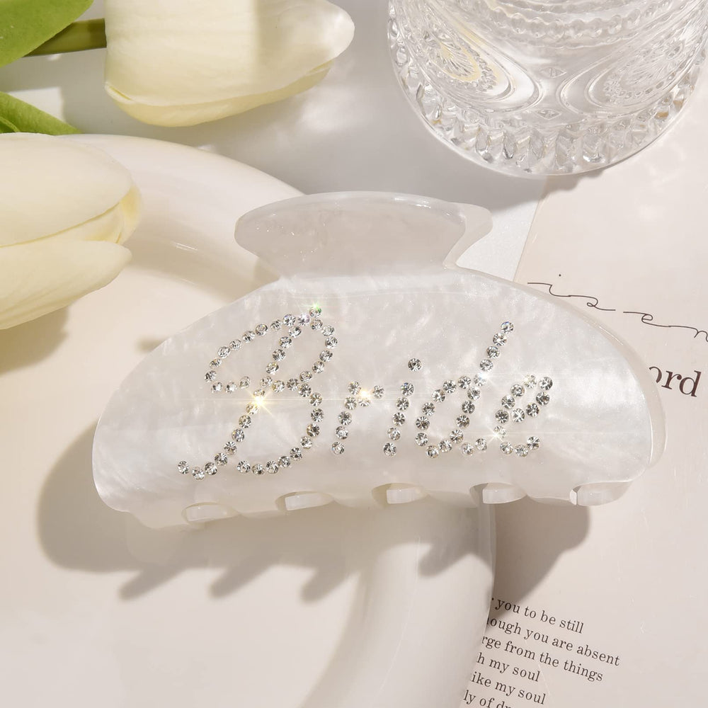 Aileam closeup of rhinestone bride logo highlighting sparkle for photos