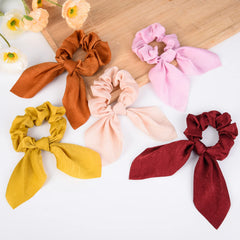 Aileam flat display of colorful scrunchies for outfit coordination
