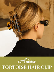 Styled outfit scene with Aileam clip adding polished accessory to dressy look benefit