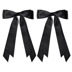 Aileam bow beside ruler showing 5.2 by 8 inch size for scale and proportion