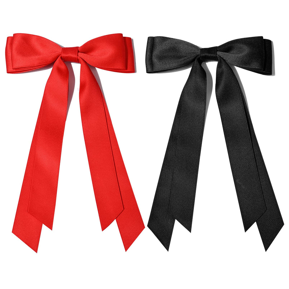 Aileam bow held in hand showing accurate 5.2 by 8 inch scale and proportion
