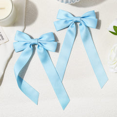 Aileam two bows laid flat showing matching pair and neat shape