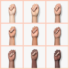 AILLSA nail swatch on hand demonstrating buildable nude pink and natural look