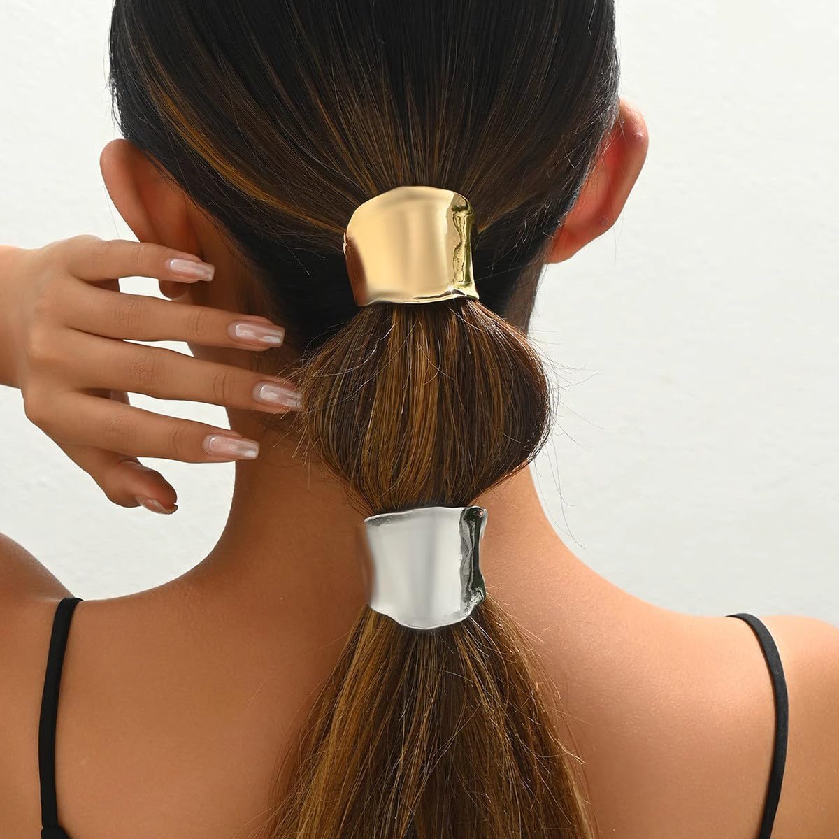 Ainvhh cuff on a high ponytail giving polished professional styling boost