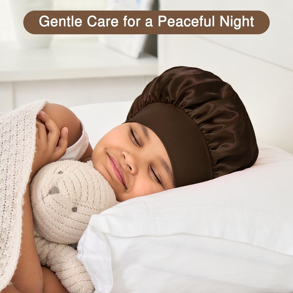 Aiphamy child wearing bonnet in bed demonstrating stay-put overnight protection
