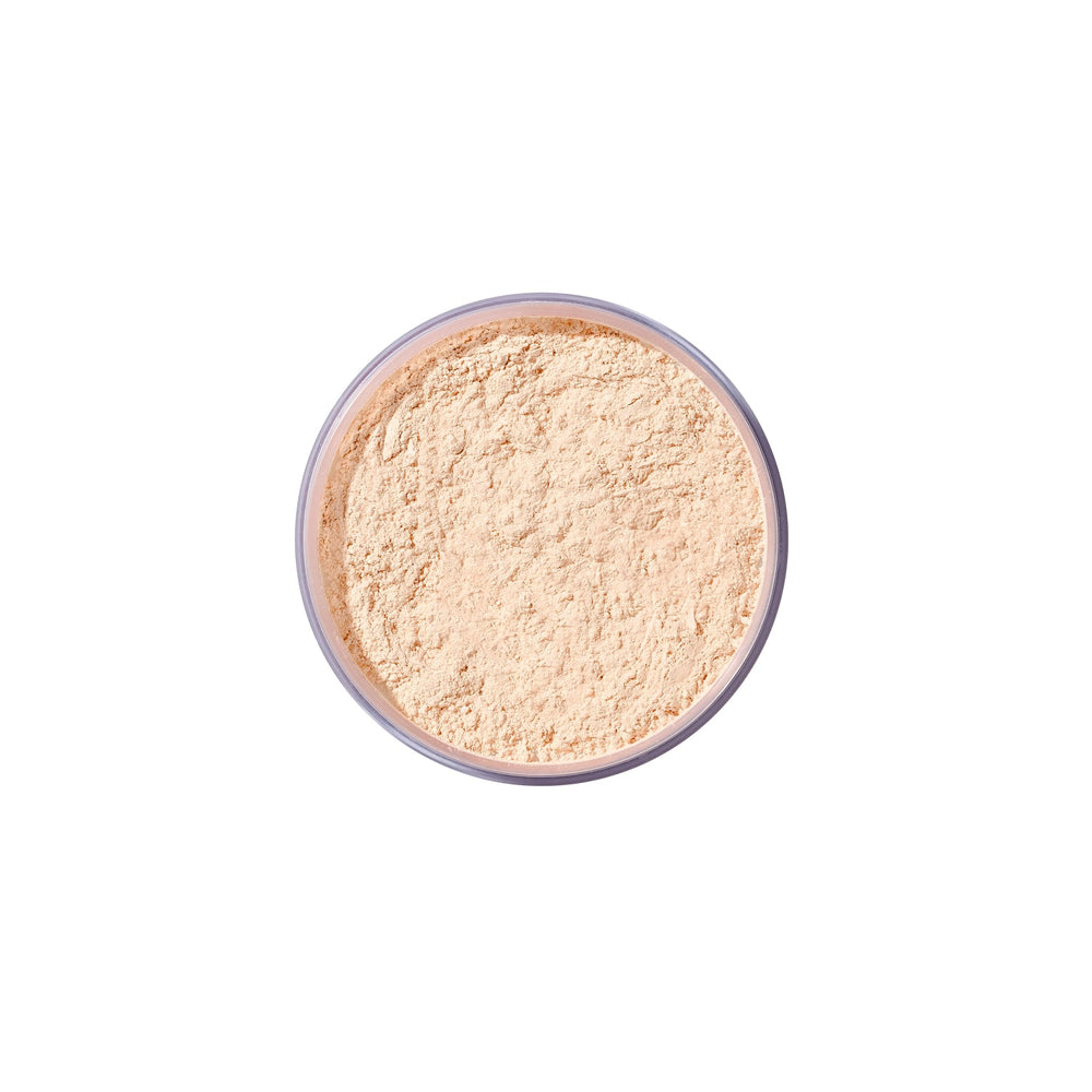 Airspun jar contents swirled to display fine powder particles and soft finish
