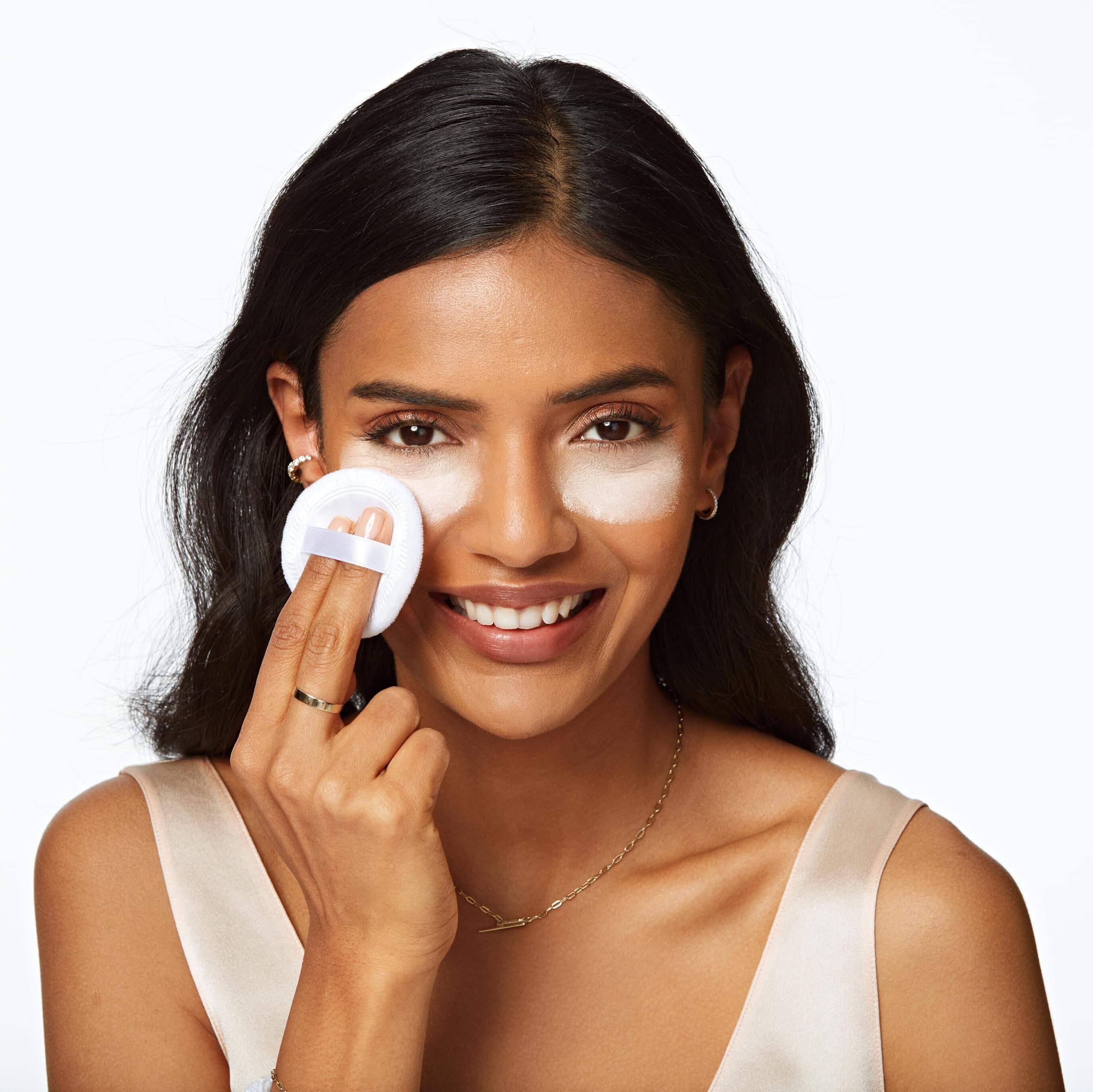 Airspun product label highlighting talc-free formula and key features