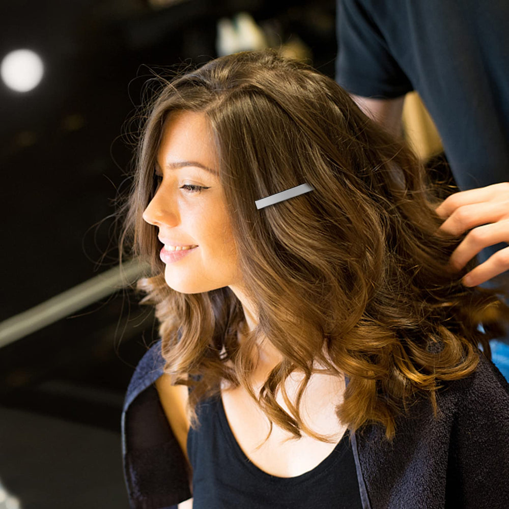 Aisuly clips used in salon styling illustrating professional-grade durability