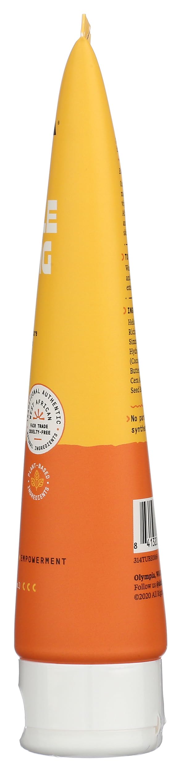 Alaffia balm held in hand for size comparison showing convenient portability benefit
