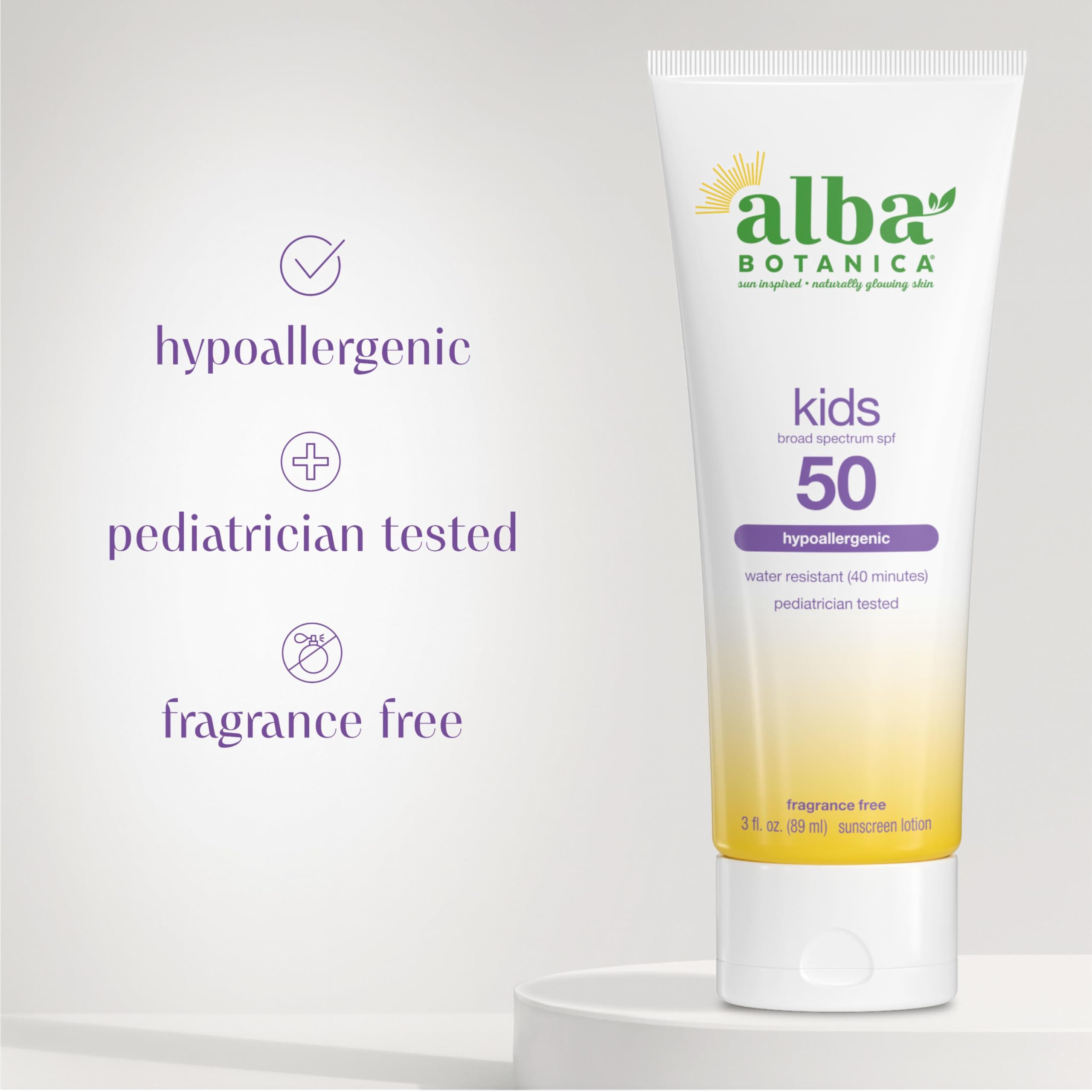 Alba Botanica tube in hand to show compact 3oz travel-friendly size