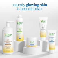Alba Botanica bottle next to hand showing travel-size convenience benefit