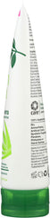 Alba Botanica 8 oz bottle in hand to show true size and portability