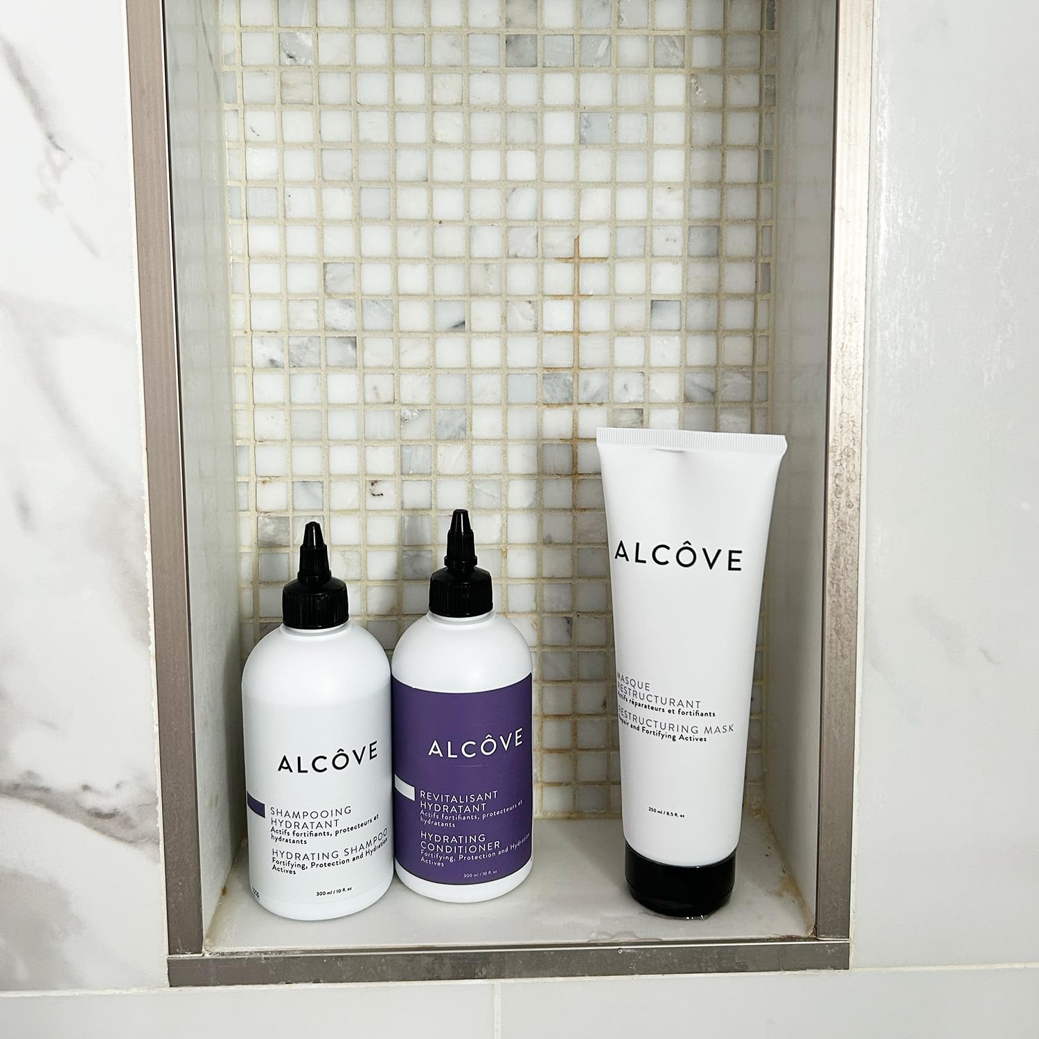 Alcôve in-use wet hair application with improved manageability