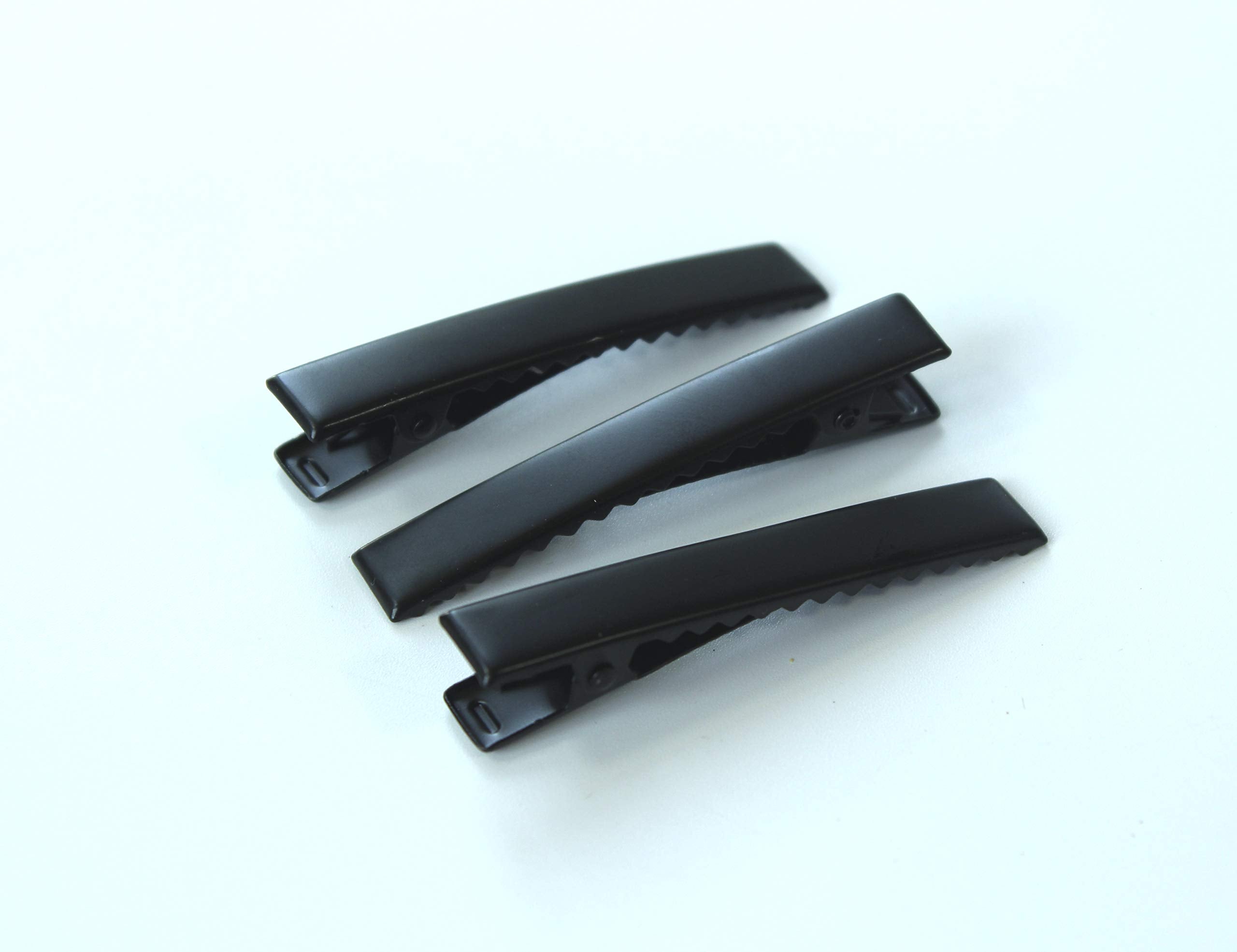 ALL in ONE front view of 50 black clips, tidy kit for DIY accessories