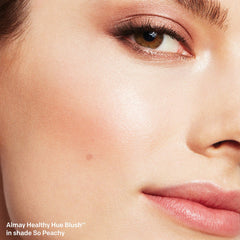 Almay compact in hand showing size and travel-friendly convenience benefit
