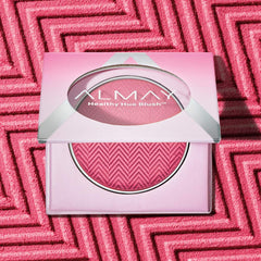 Almay blush pan close-up revealing high-pigment powder and smooth finish