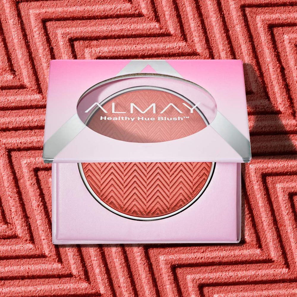 Almay close-up of powder pan revealing fine texture for smooth blending