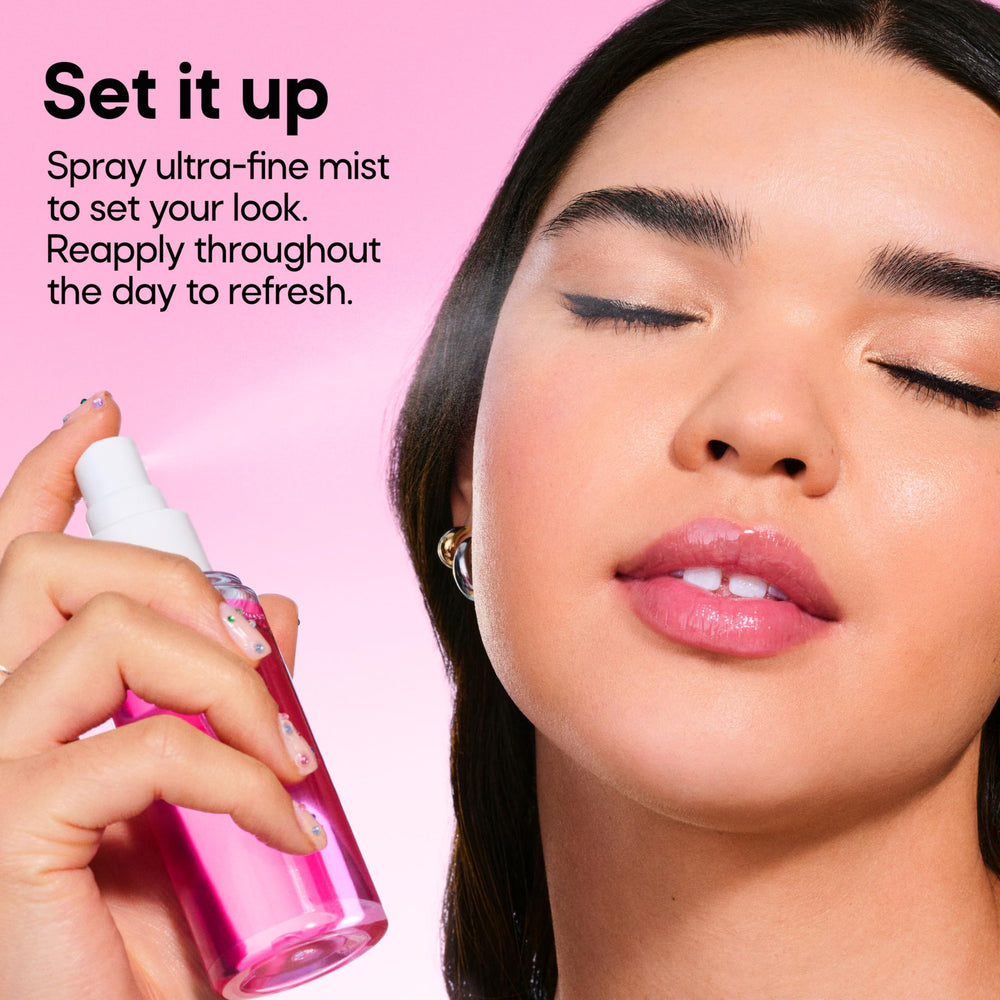 Almay mist refreshing a model’s makeup for instant glow and hydration
