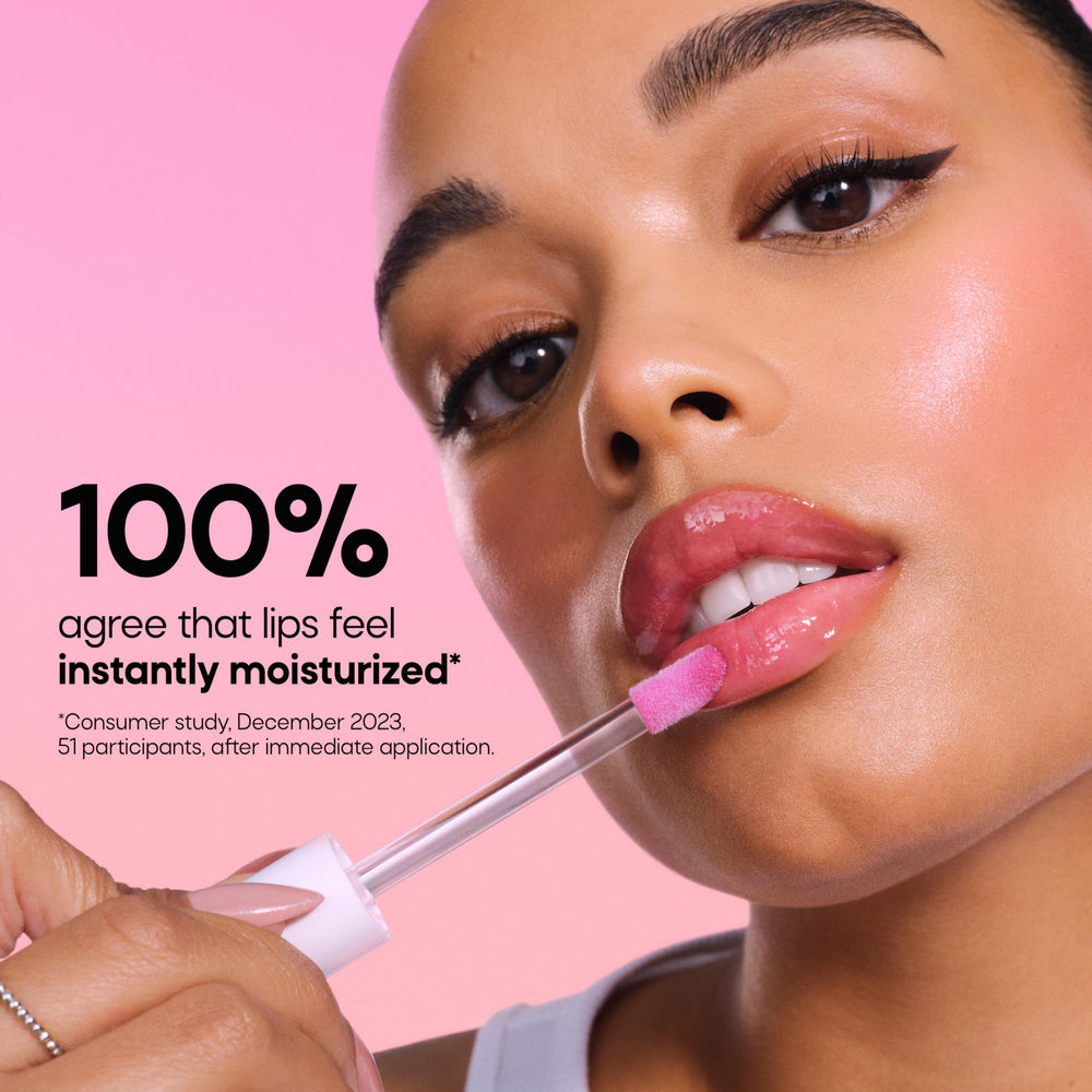 Almay Gleam Big worn on lips in lifestyle shot for luminous natural color