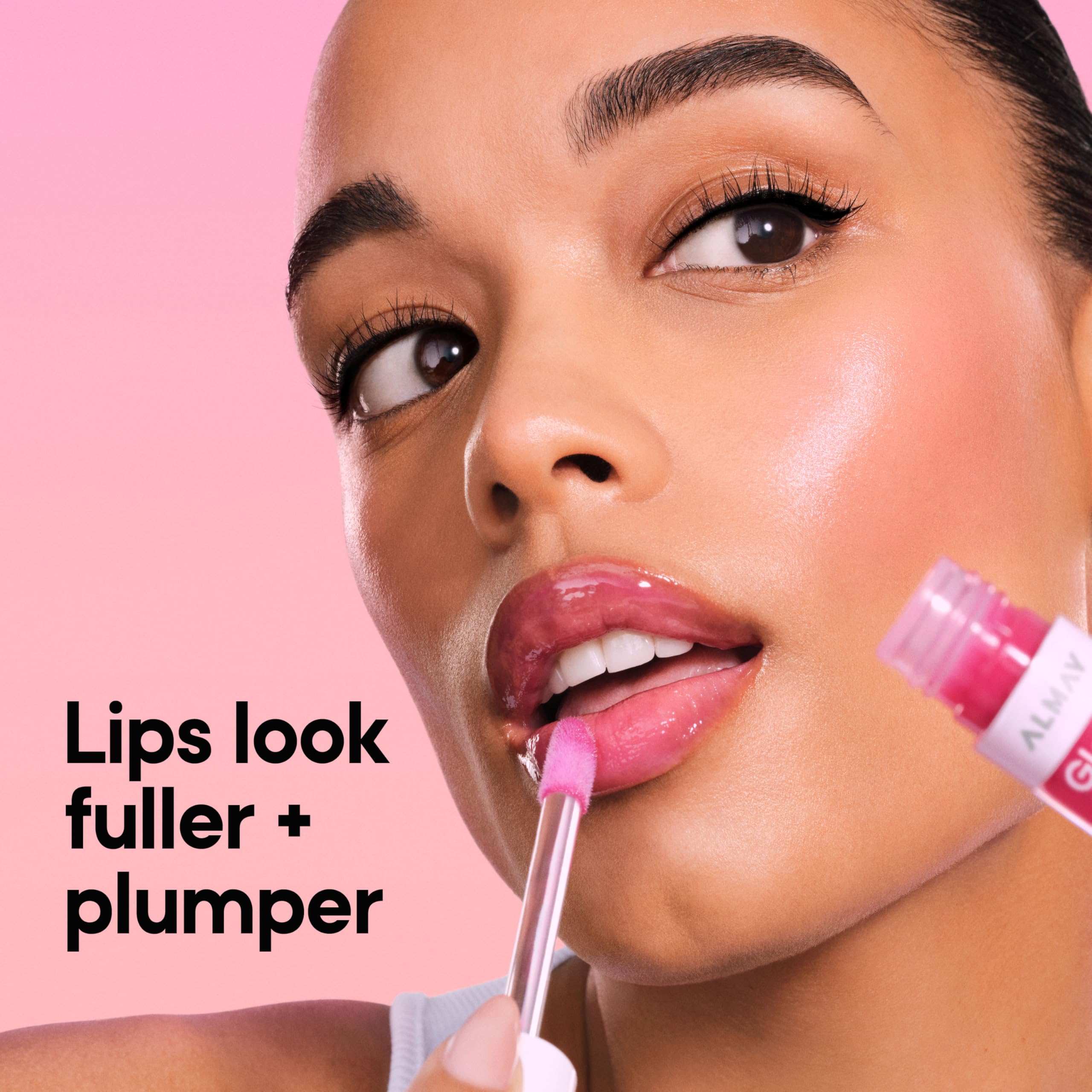 Almay Gleam Big open cap and applicator demonstrating easy glide
